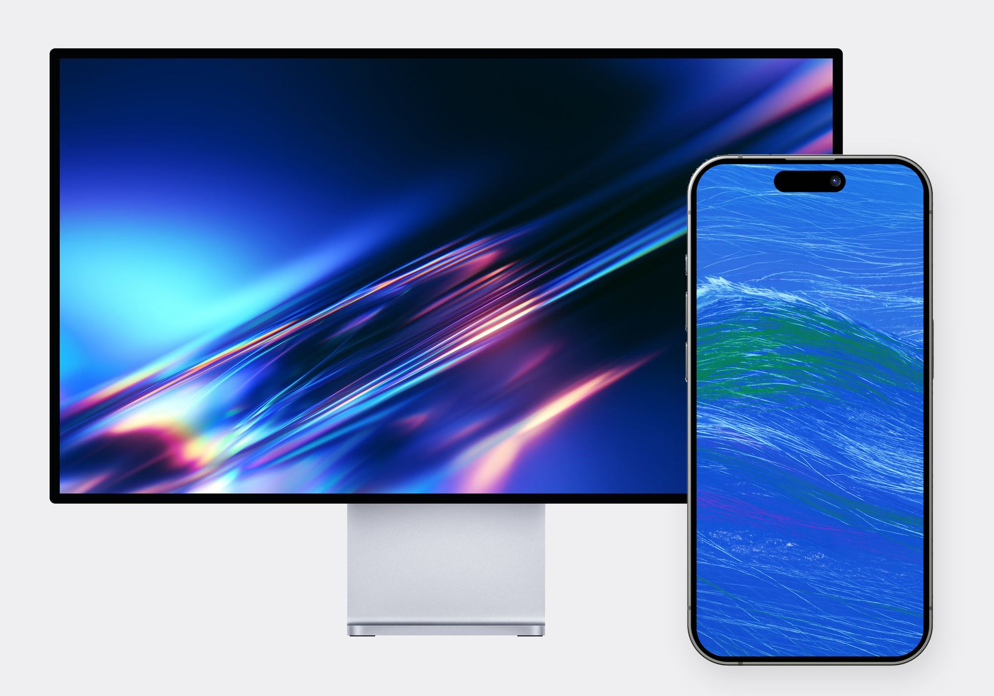 Chroma Packs wallpapers on a desktop monitor and a phone